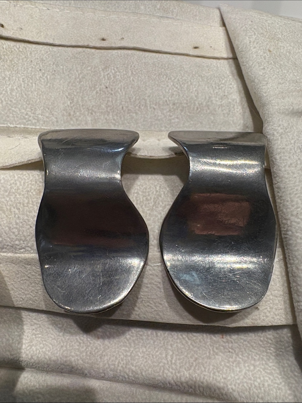 Silver Sculptural post pierced Earrings by ROBIN KAHN.